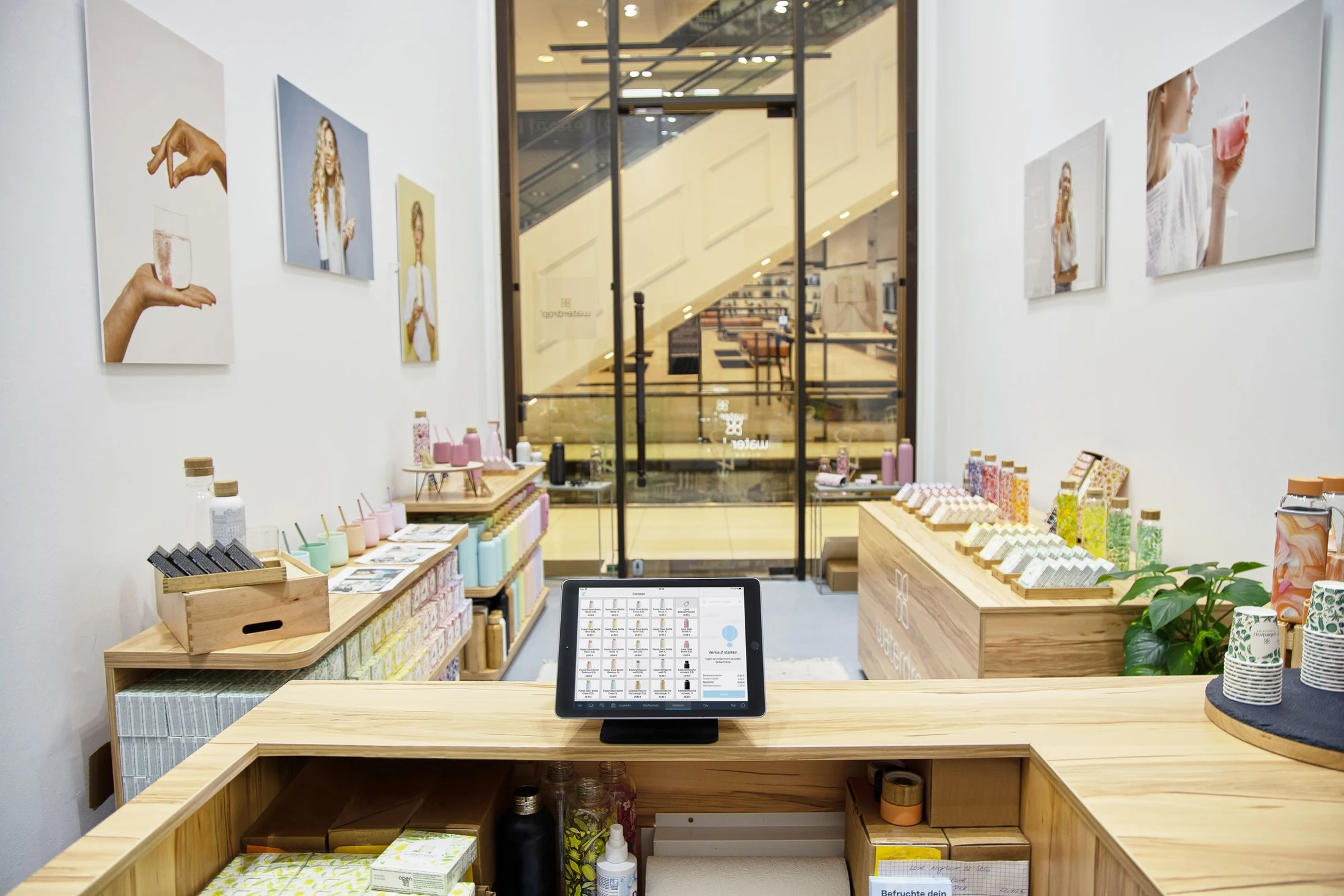 A tablet checkout on the counter of a real retail shop