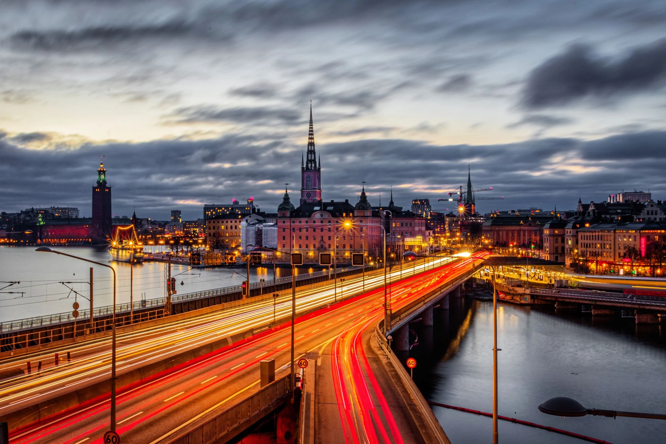 Traffic and lights on Centralbron in Stockholm at dusk