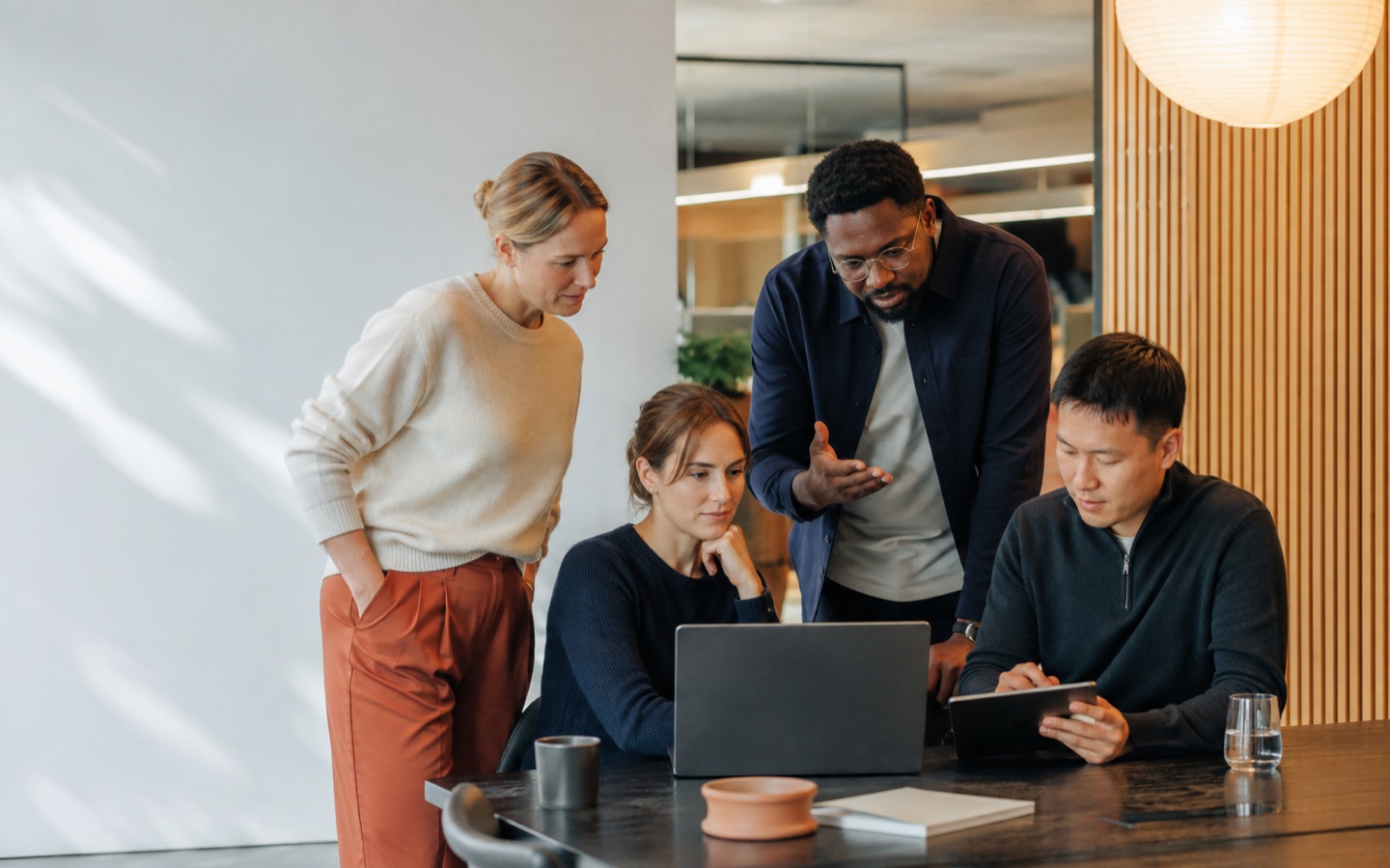 Customer-facing team using CRM together during a practical working session