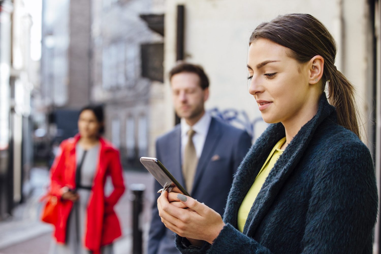 Business clients receiving instant CRM Alerts updates on smart phone and tablet